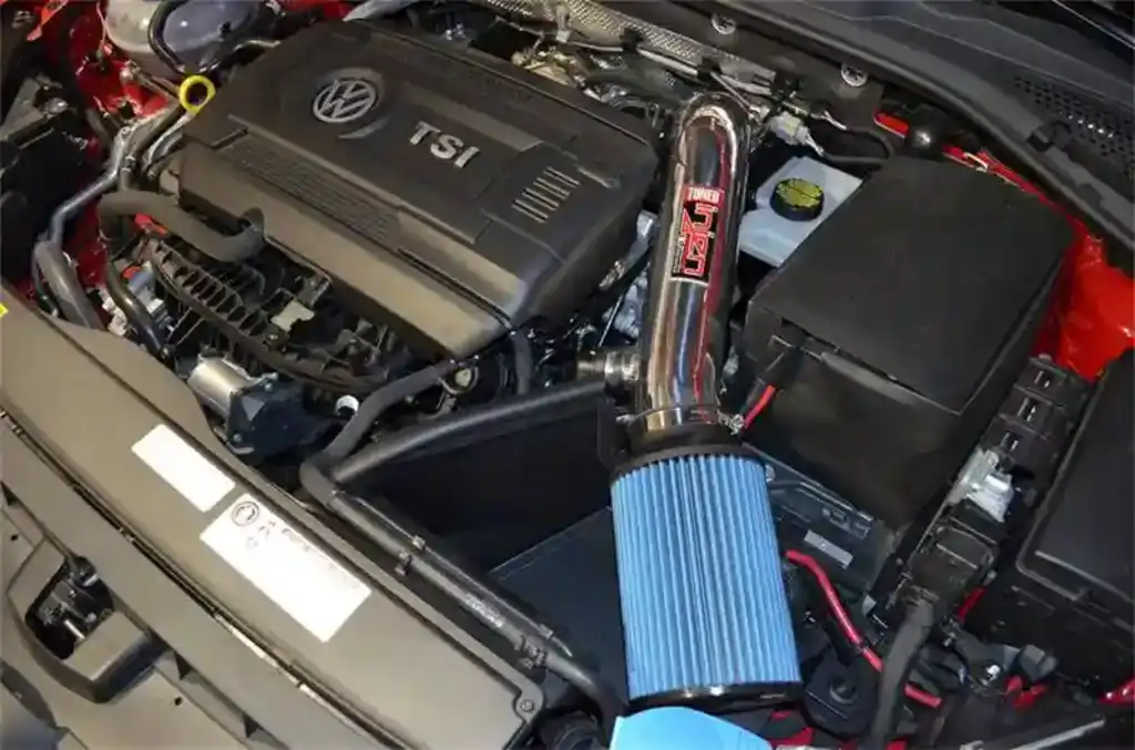 What is the purpose of the short ram intake system?