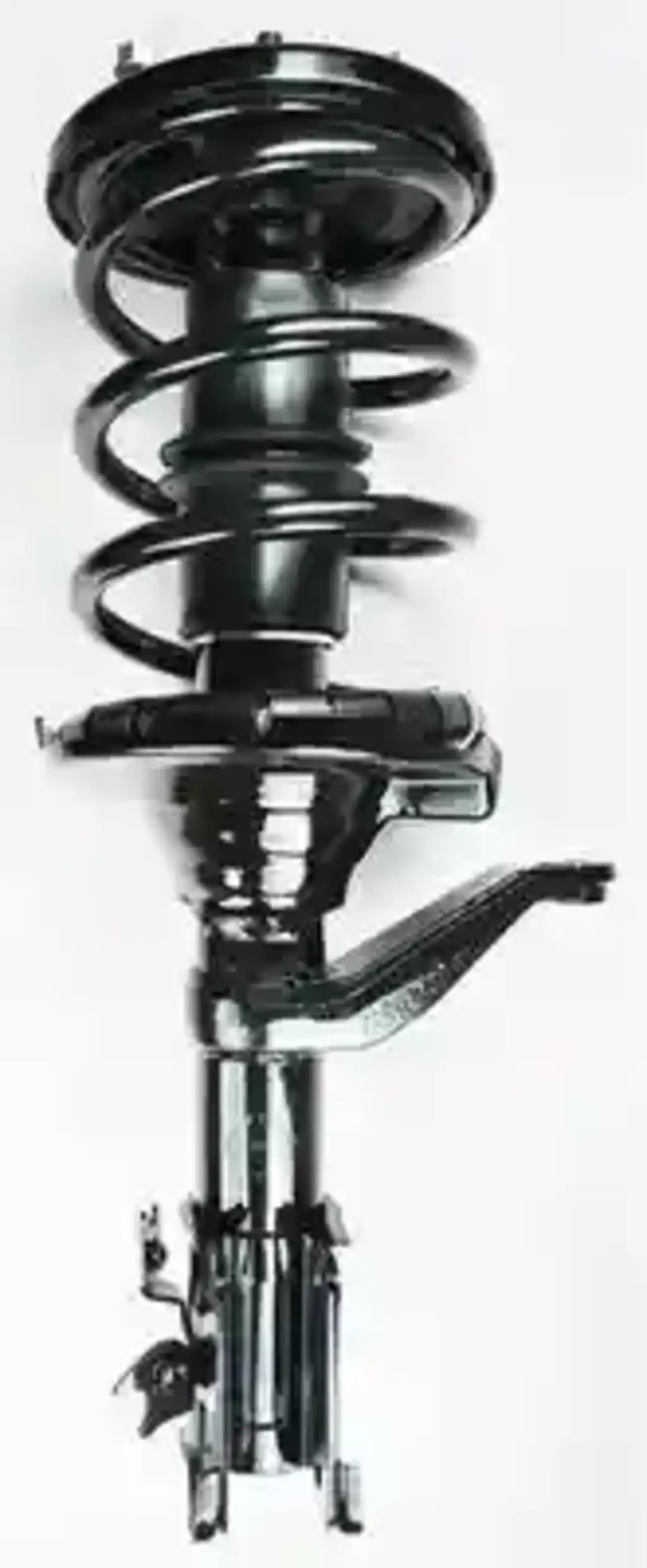 What type of spring is used in a MacPherson strut?