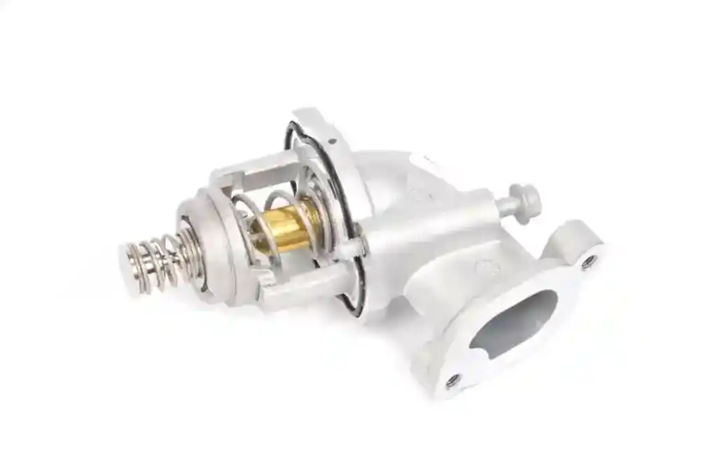 What are the benefits of using this thermostat housing in my vehicle?